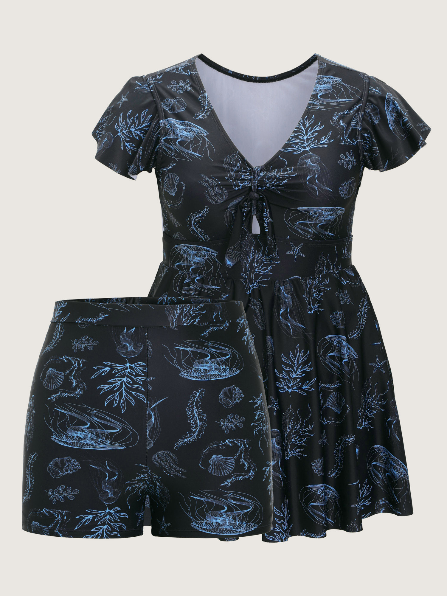 Side view of BloomChic Women's Plus Size Jellyfish Print Pockets Flowy Swim Dress Black Marine Elements Lace-Up Adjustable Straps 14-16/1X