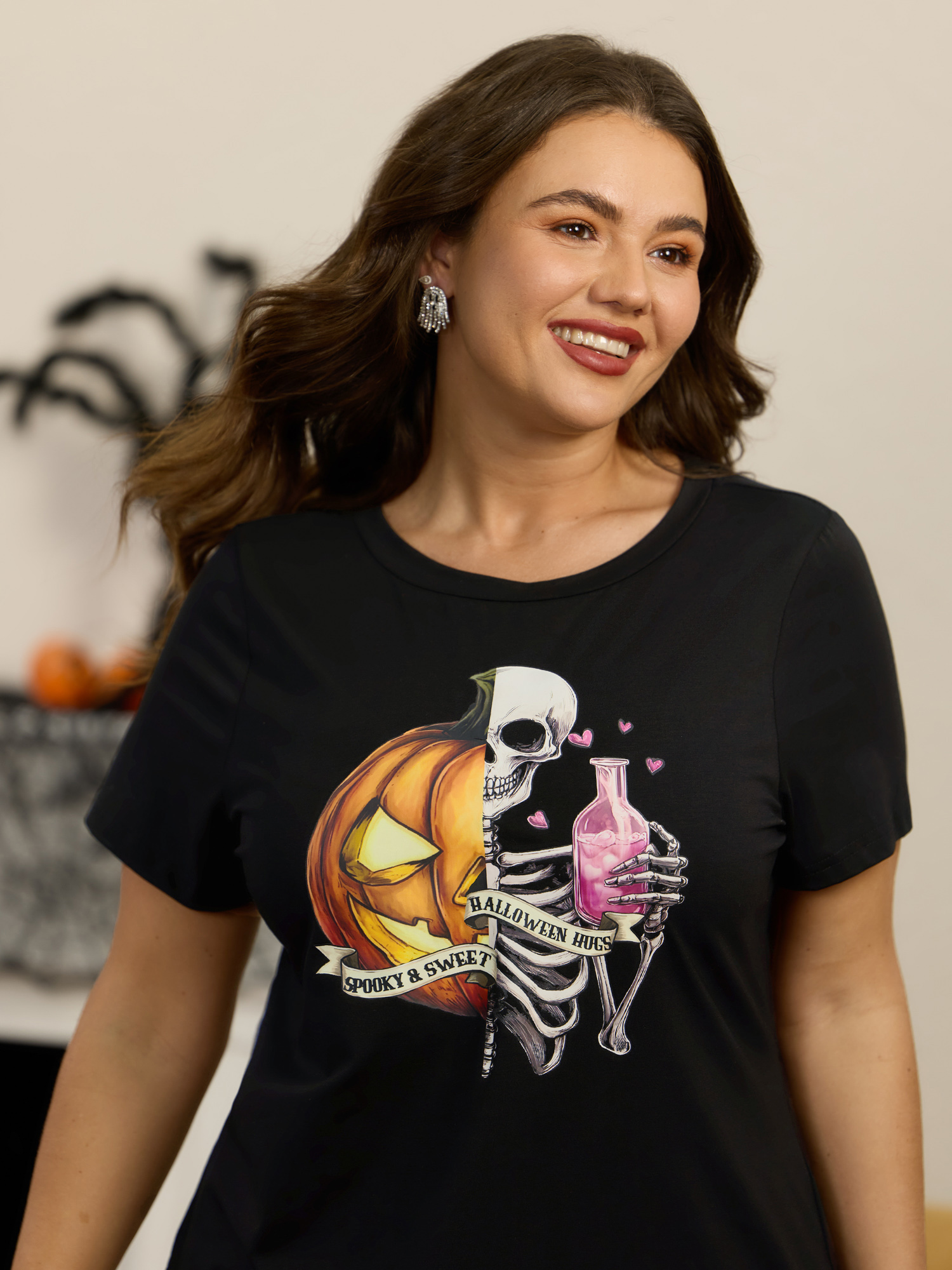 BloomChic Plus Size Halloween Pumpkin Skull Print Curved Hem T‑Shirt - Women's Black Solid Round Neck Comfort Midsection Fit Long Sleeve Playful T-shirts 14/M
