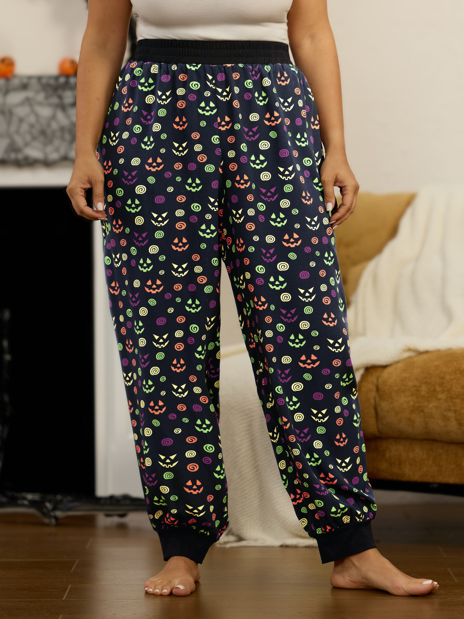 BloomChic Women's Plus Size Supersoft Halloween Ghost Face Print Lounge Bottoms Black 10/M