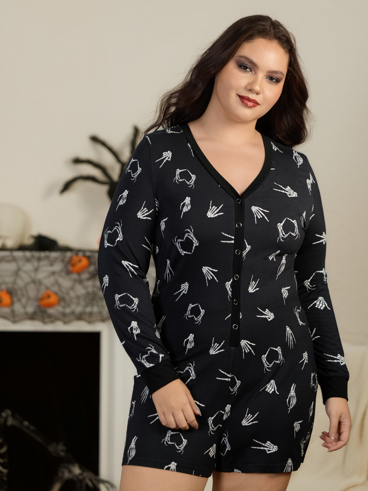 BloomChic Women's Plus Size Supersoft Skeleton Hand Heart Print Button Down Lounge Jumpsuit Black short 10/M